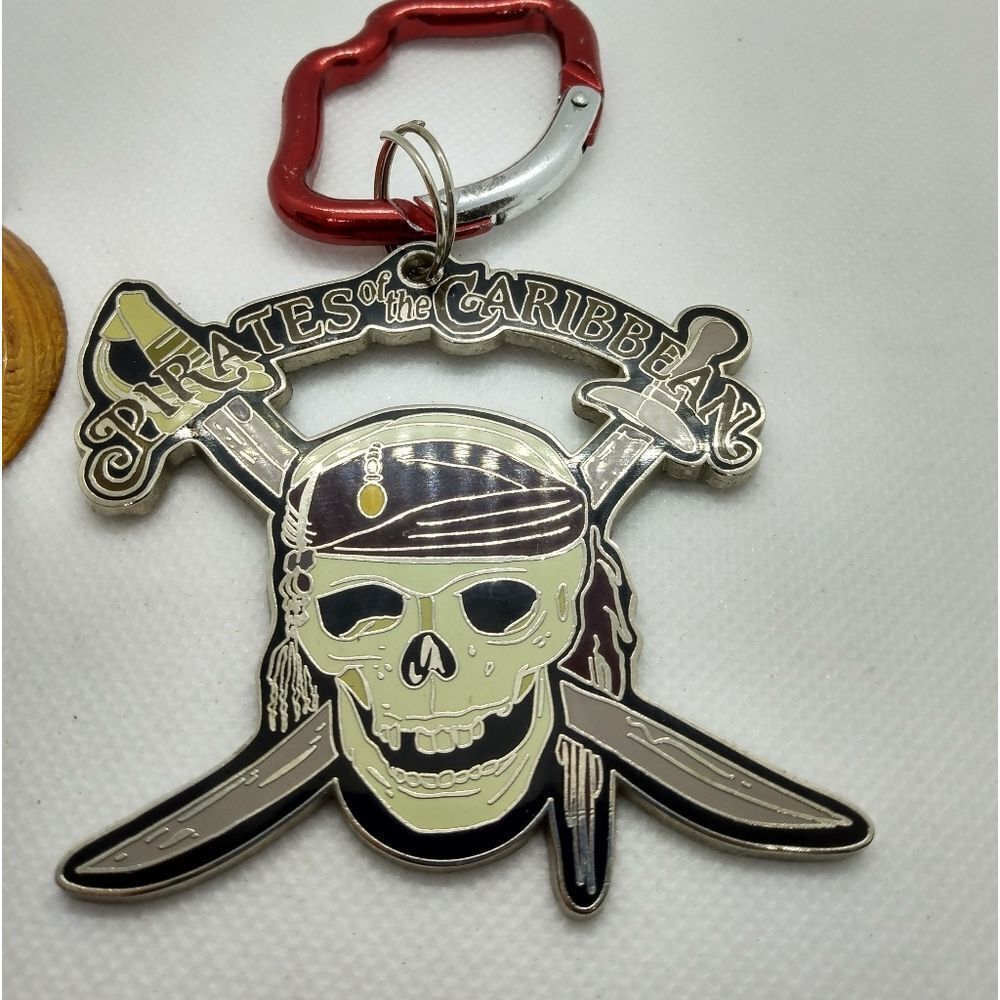 Disney skull and swords Vintage pirates of the Caribbean keychain